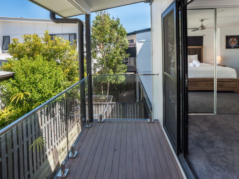 Private balcony with outdoor view.