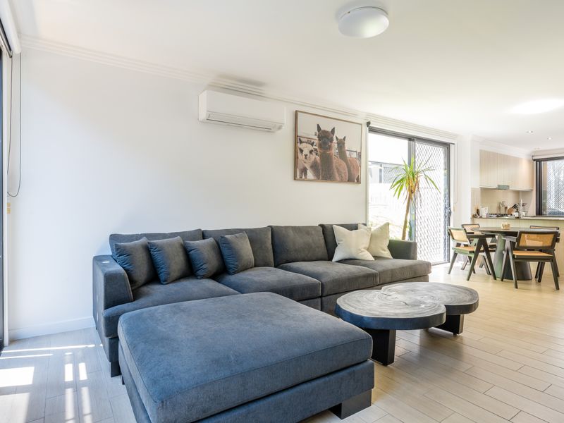 Living area with comfortable sofa and open-plan layout.