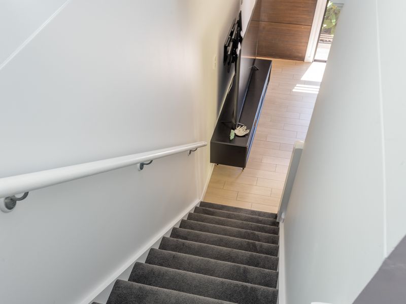 Stairway access leading to upper level.