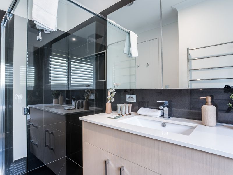 Bathroom with walk-in shower.