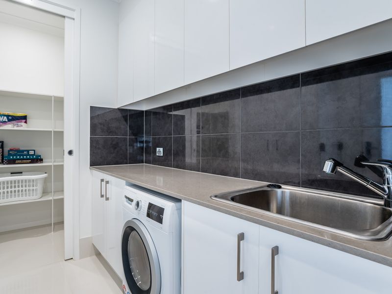 Sleek modern kitchen with quality appliances.