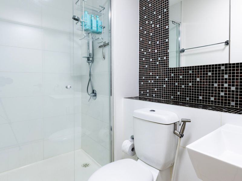 Modern bathroom with glass shower and clean design