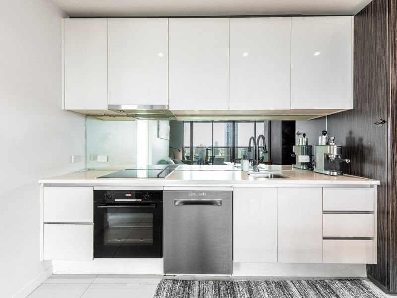 Sleek, fully equipped kitchen with modern appliances