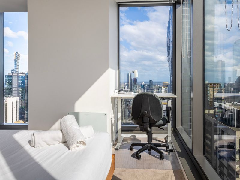 Cozy bedroom corner with work desk and stunning view