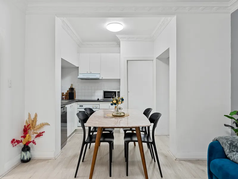 Seamless flow from dining to kitchen for easy entertaining