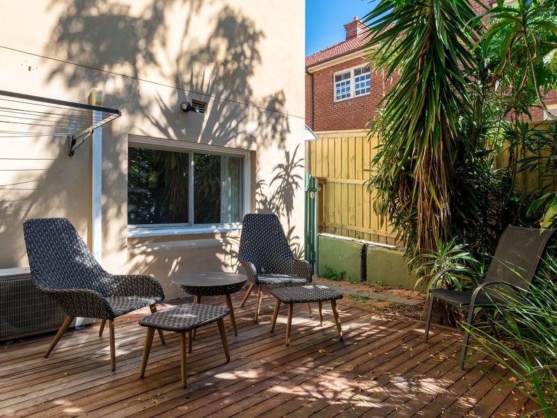 Cozy outdoor lounge perfect for morning coffee or evening drinks