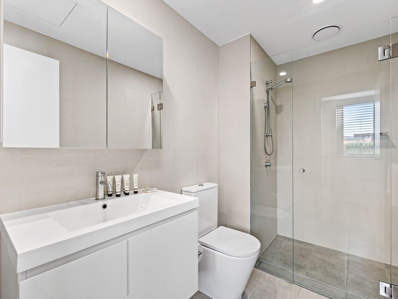 Ensuite Bathroom with a walk-in shower and simple finishes.