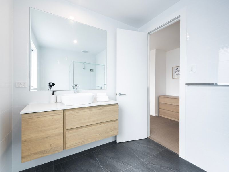 Fresh, modern bathroom with double vanity.