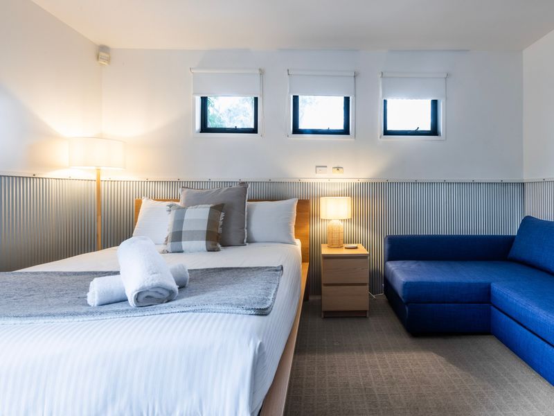 Stretch out and relax in this cosy bedroom.