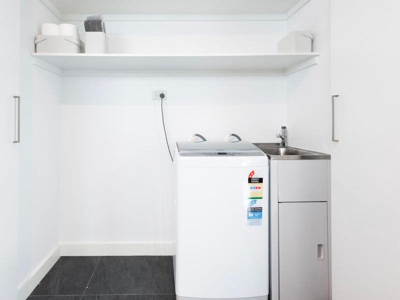 Handy laundry nook for those longer stays.