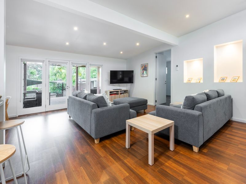 Sunlit lounge perfect for relaxing with family.