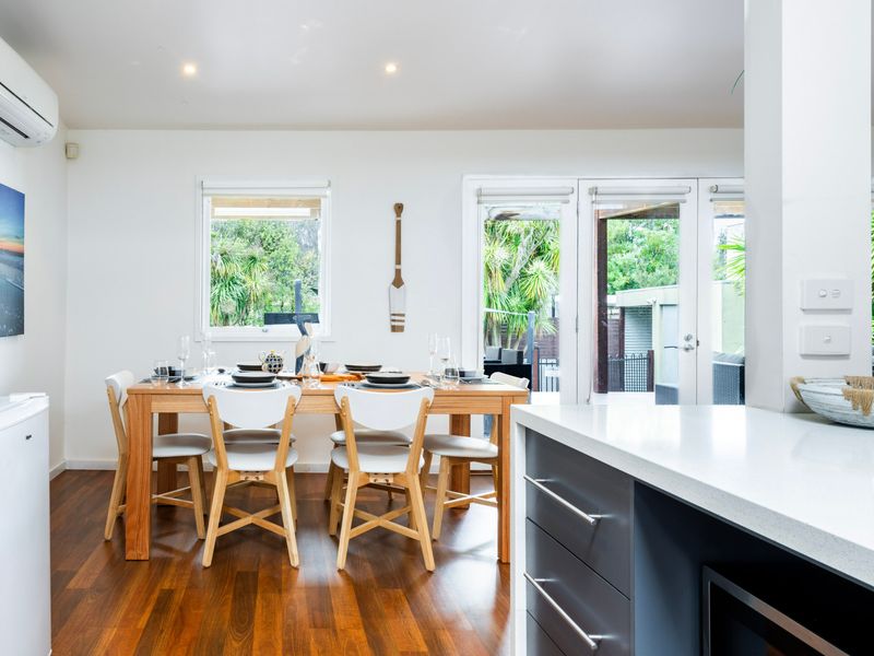 Light-filled dining space beside the kitchen.