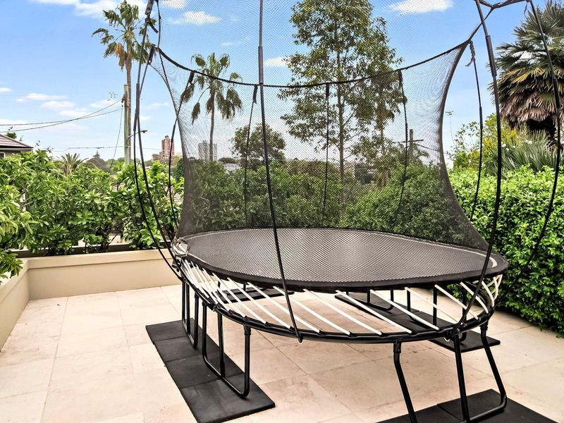 Private courtyard with trampoline for family fun
