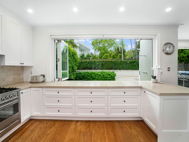 Light-filled kitchen with garden views and ample bench space