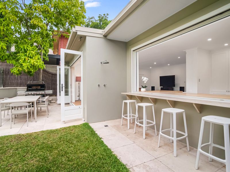 Alfresco dining area with seamless indoor-outdoor connection