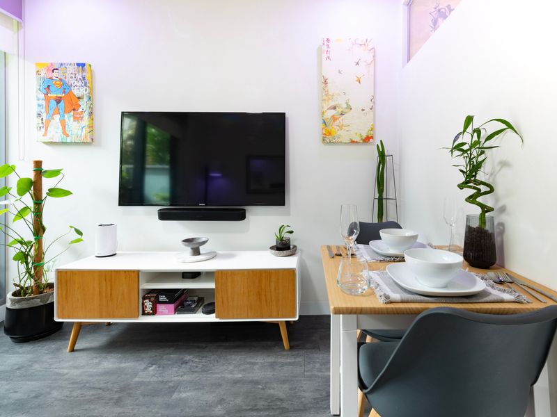 Cozy bedroom with soft linens, warm lighting, and elegant touches.