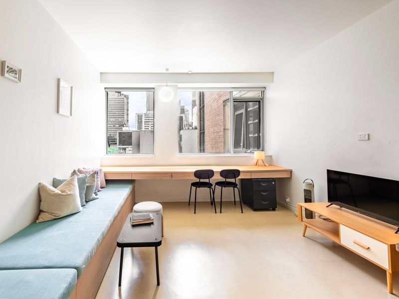 Comfortable lounge and dining area perfect for relaxing or working.