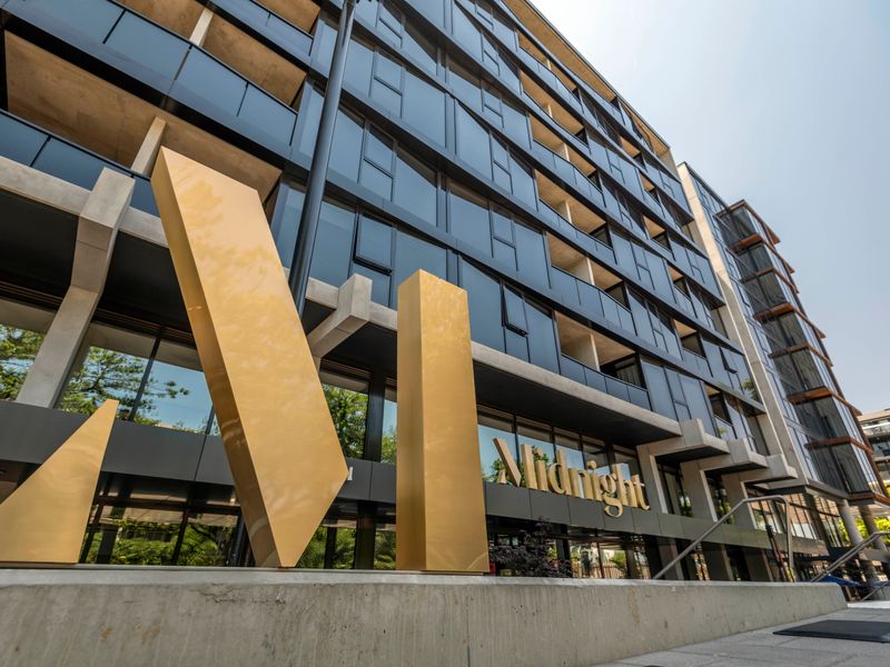 Modern apartment building exterior with secure entry.