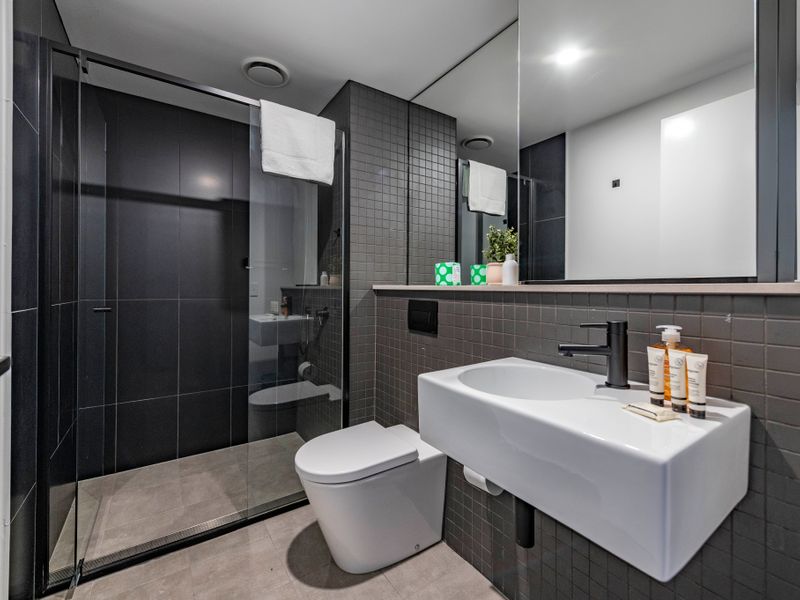 Contemporary ensuite featuring premium finishes and walk-in shower