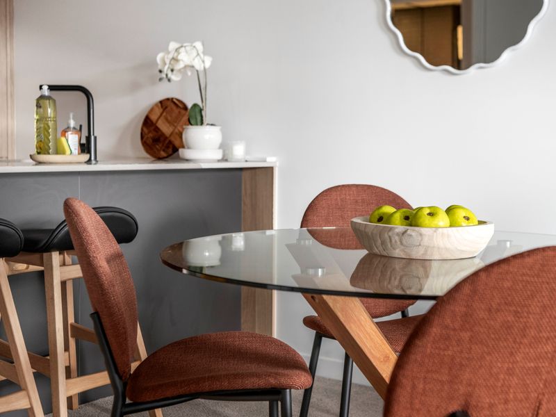 Round dining table perfect for casual meals.