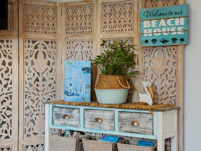 Coastal-inspired entryway with decorative details.
