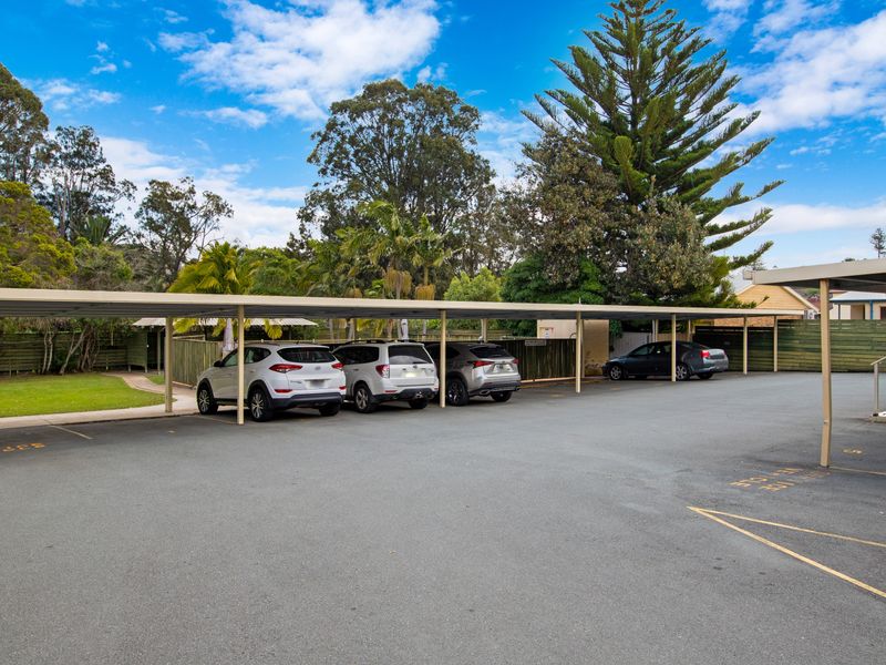 Covered car park for guest convenience.