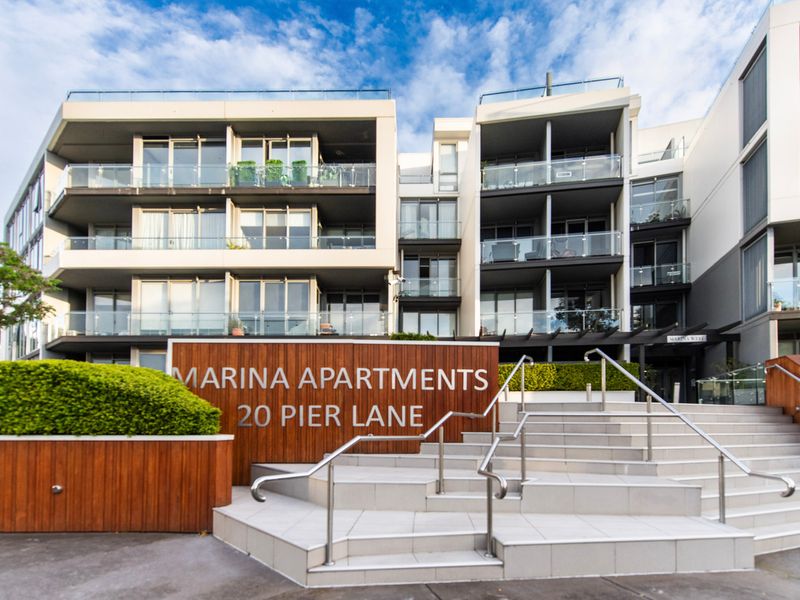 Located in the elegant Marina Apartments — modern living by the water.