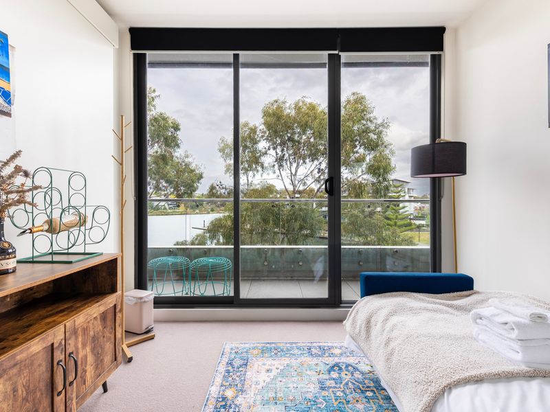 Floor-to-ceiling windows bring the outdoors in — bright and relaxing.