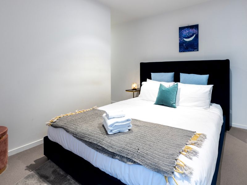 Comfortable bedroom with fresh linens and a cozy, restful vibe.