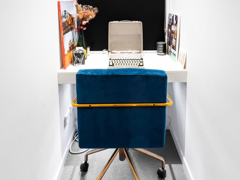 Dedicated workspace with a comfortable chair — ideal for remote work.