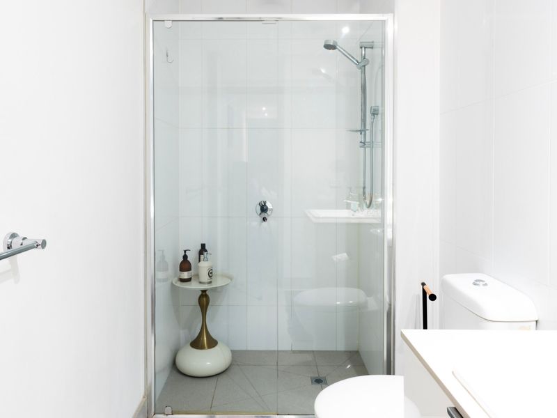 Walk-in shower and clean finishes for a refreshing start to your day.