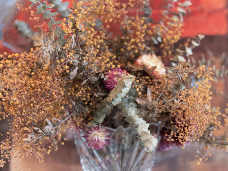 Local artwork and natural textures bring warmth and character to the space