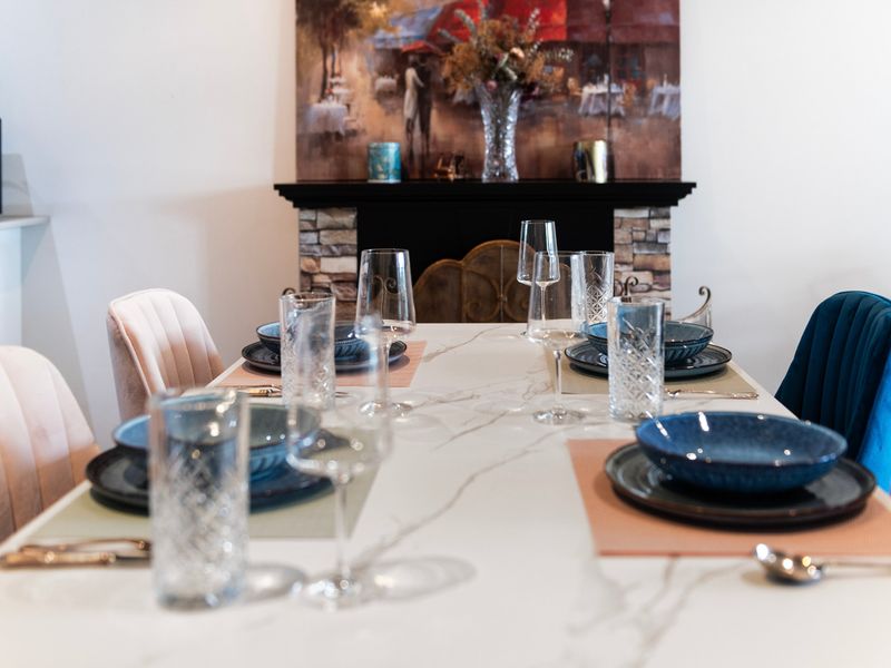 Beautifully set dining table ready for shared meals and conversations.