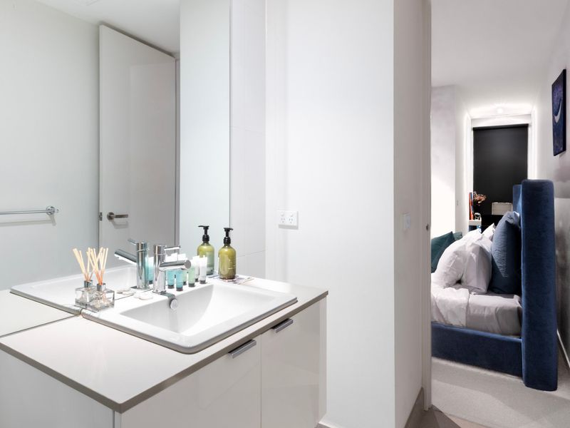 Modern bathroom with fresh amenities and a sleek, minimalist design.