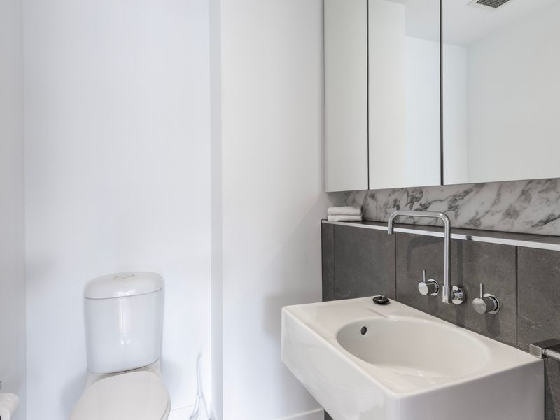 Compact utility area with additional sink and storage