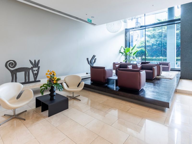 Modern building lobby with stylish seating and natural light