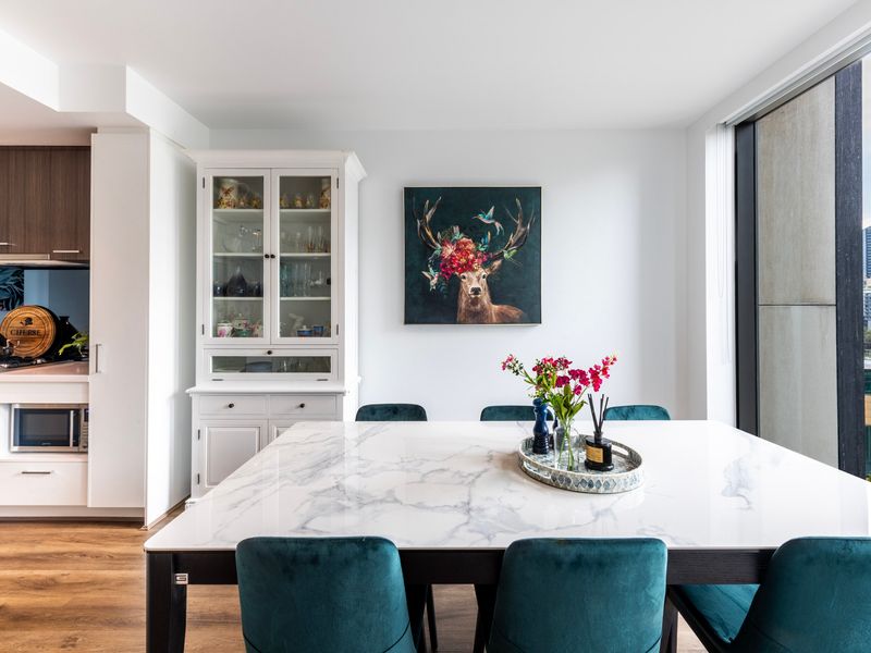 Inviting dining space beside a fully equipped kitchen
