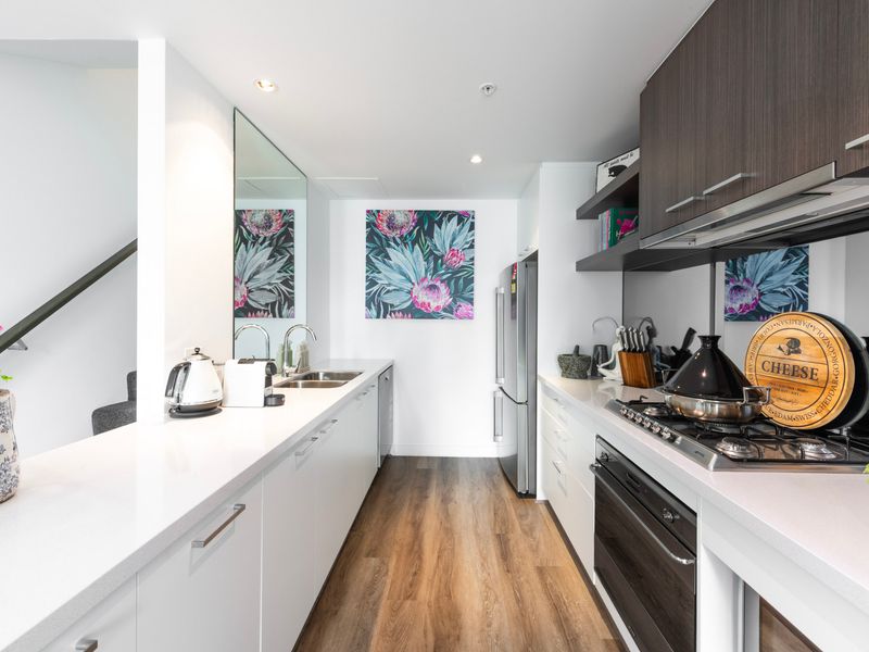 Sleek kitchen with ample counter space and stylish finishes