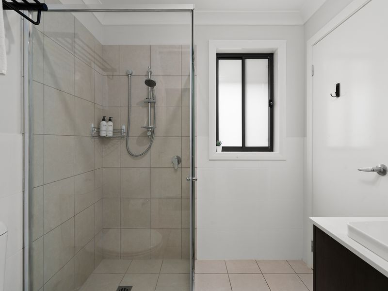 Relax and recharge in this sparkling bathroom.