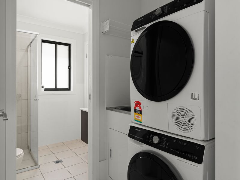 Clean and functional laundry space.