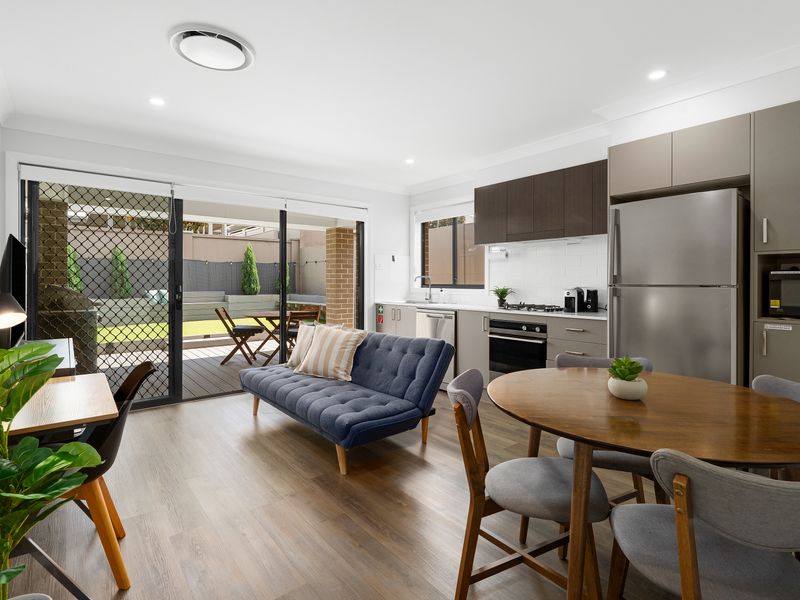 Modern kitchen with all essentials provided.