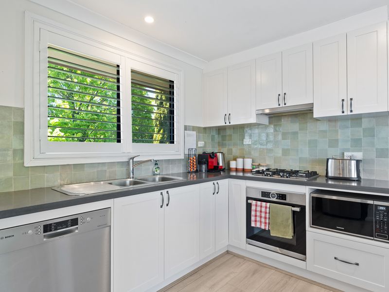 Modern kitchen with stainless steel appliances