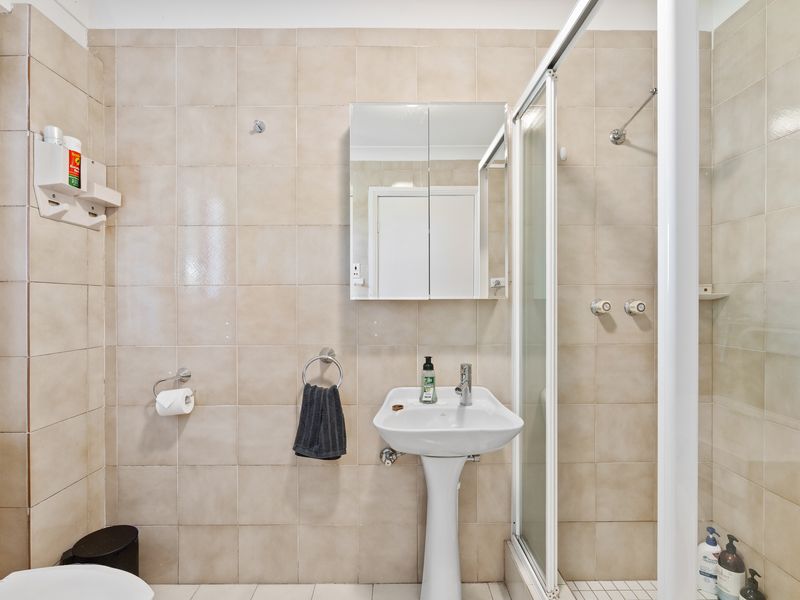 Sparkling clean bathroom with walk-in shower