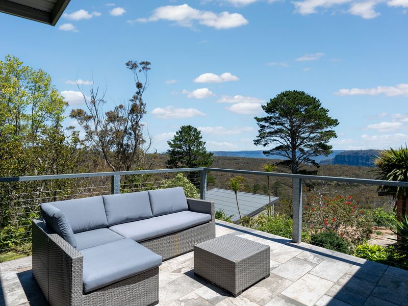 Balcony seating with sweeping valley views