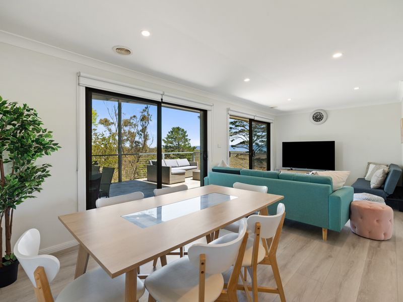 Sunny living and dining space perfect for shared meals and chill time