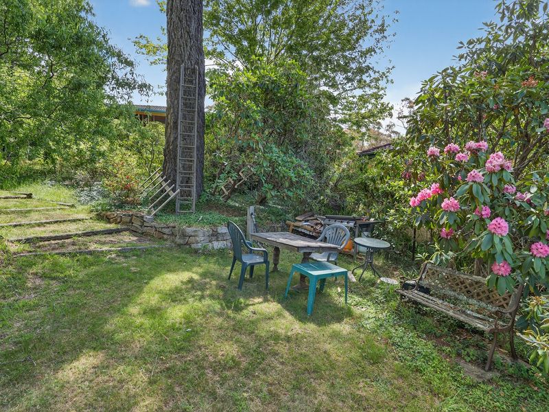 Rustic garden setting with a table for relaxed outdoor dining.