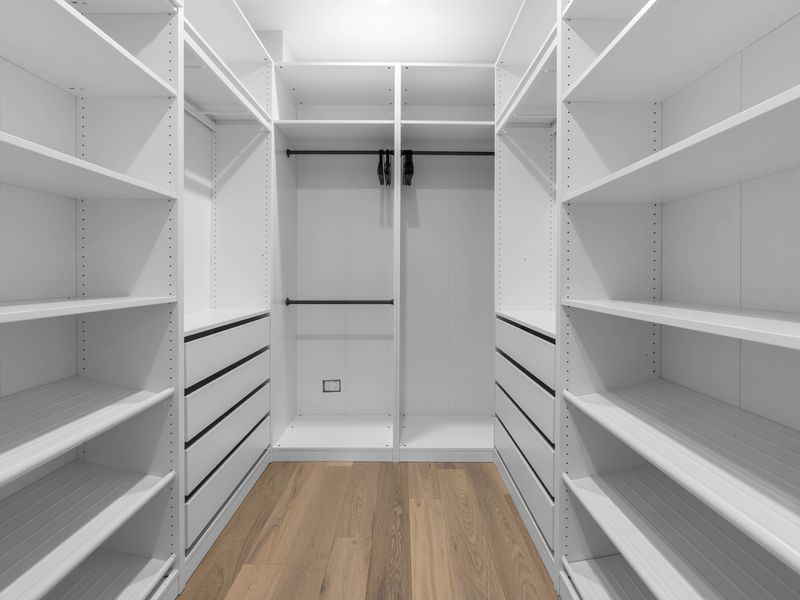 Walk in closet with ample storage space