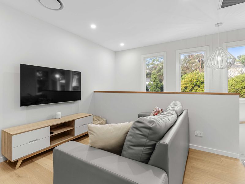 Light-filled entertainment area for slow mornings or movie nights