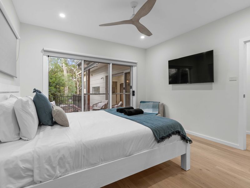 Master bedroom with direct access to outdoor seating