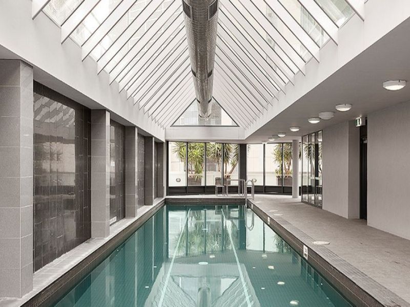 Metro Glow – Sleek Stay with Pool & Perks